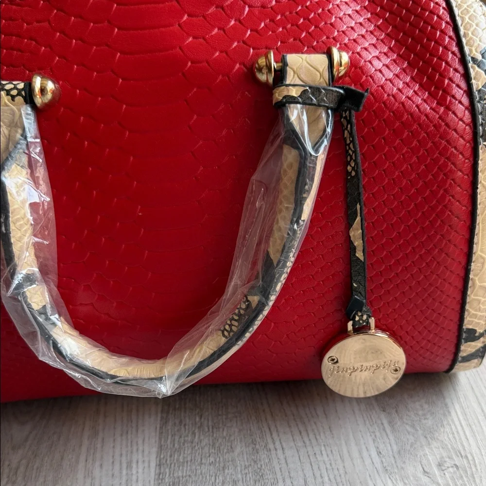 Elegant Red and Tan Satchel